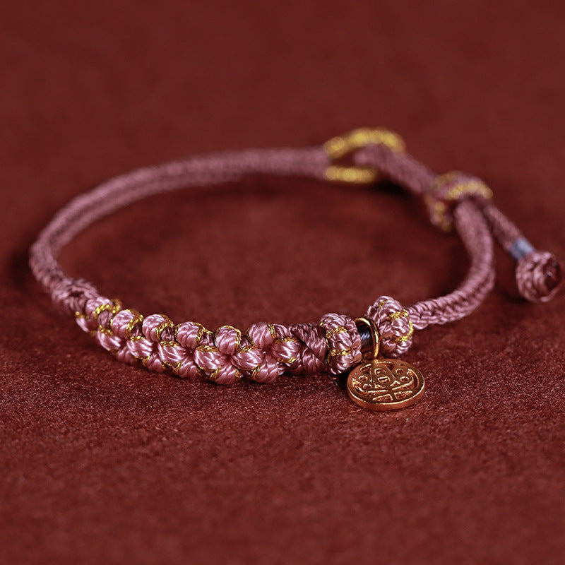 Rotes gewebtes buddhistisches Perlenarmband für Glück und Frieden