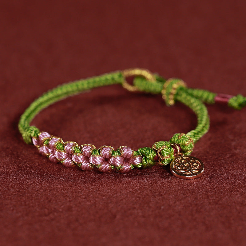 Rotes gewebtes buddhistisches Perlenarmband für Glück und Frieden