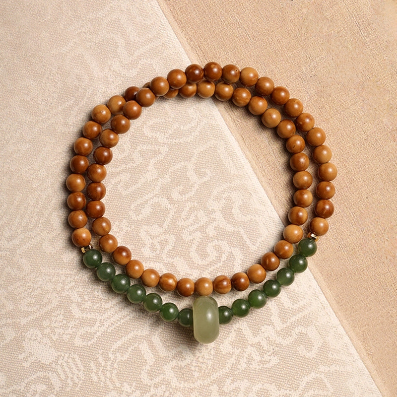 Mountain Green Style High Polish Kukui Nut With Hetian Jade Double Loop Bracelet