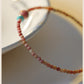 Natural Rhodonite Bracelet With Lucky Charm And Minimalist Design
