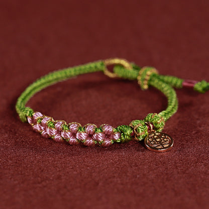 Rotes gewebtes buddhistisches Perlenarmband für Glück und Frieden