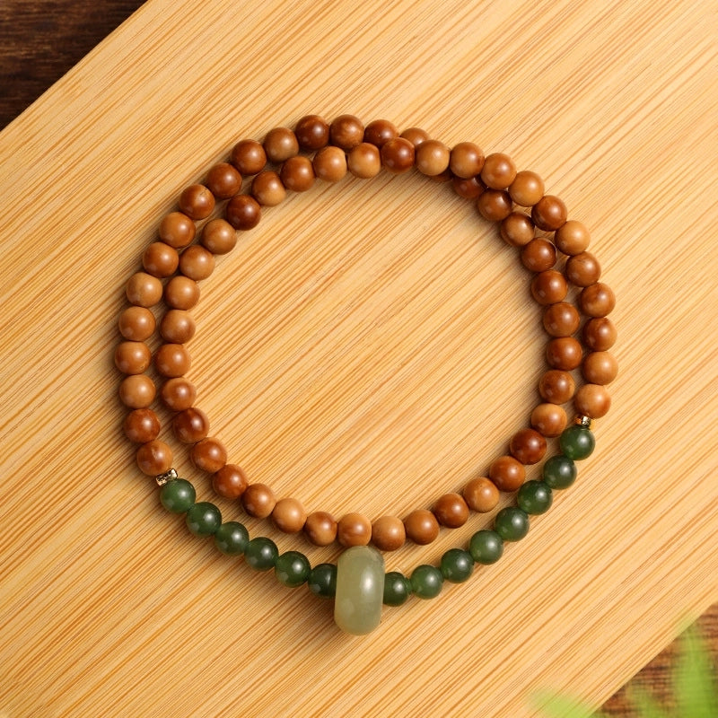 Mountain Green Style High Polish Kukui Nut With Hetian Jade Double Loop Bracelet