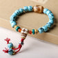 Original design imitation turquoise net flower old barrel bead bracelet tiger tooth bead with yak bone