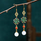 Elegante Vintage vergoldete Jade-Imitation, buddhistisch inspirierte spirituelle Ohrringe